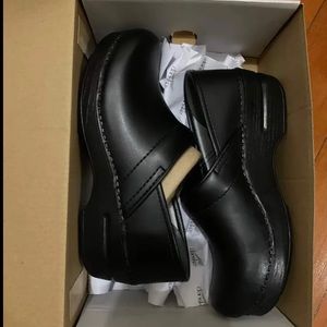 Brand new in box black Dansko clogs size 37.